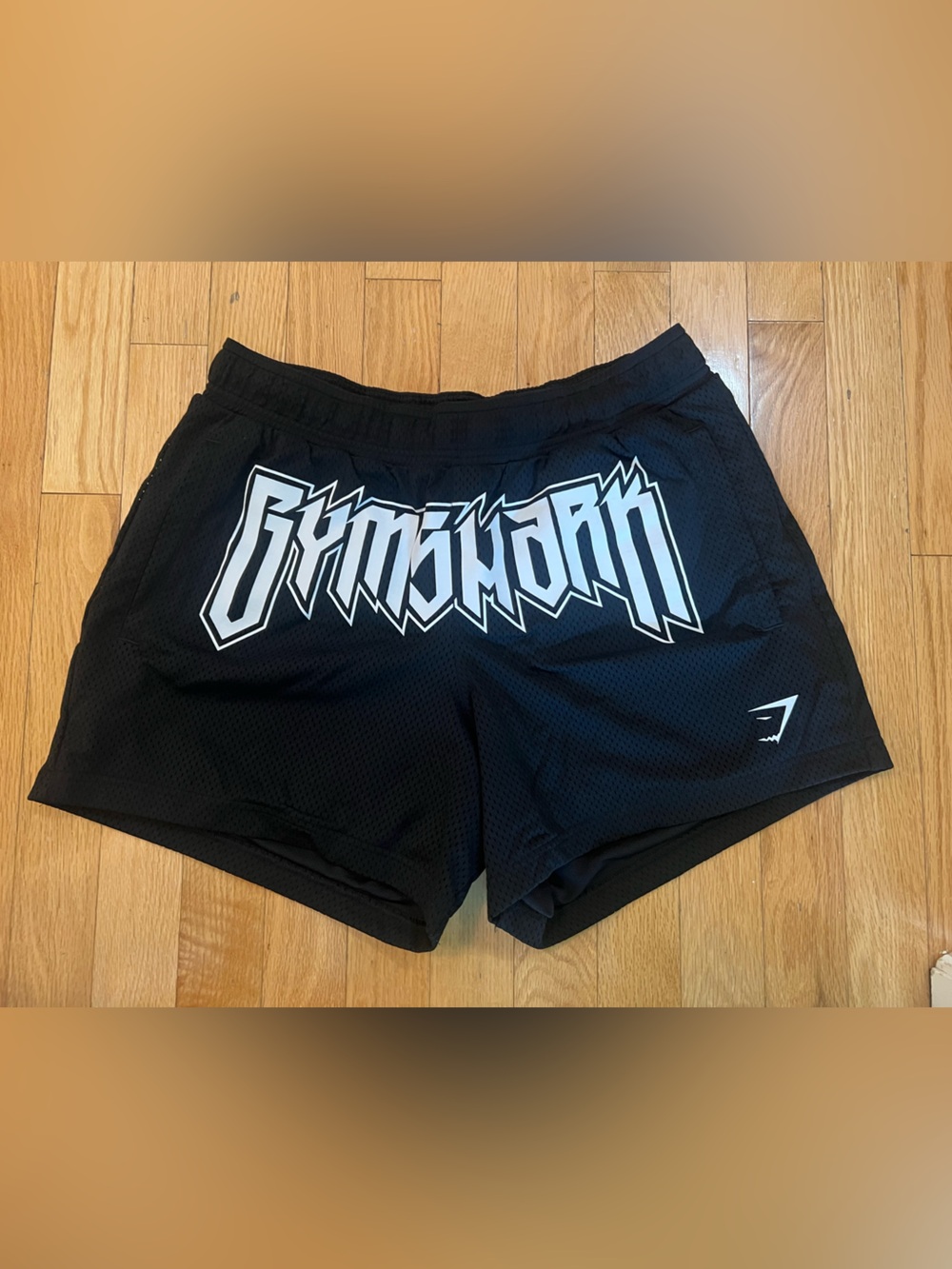 Gymshark Men’s Black Shorts with White Logo Accent